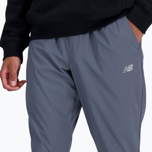 Мъжки панталони New Balance AC Stretch Woven 29 Inch graphite