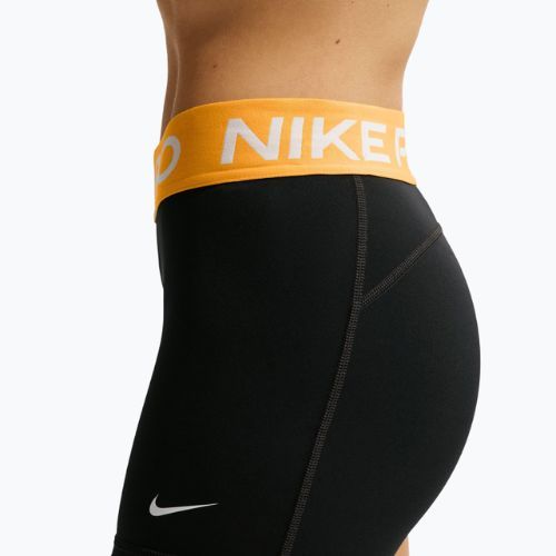 Дамски шорти Nike Pro Mid-Rise Biker 3“ black/university gold/white
