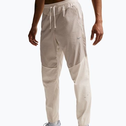 Мъжки панталони за бягане Nike Stride Repel Woven cream li/birch/natural