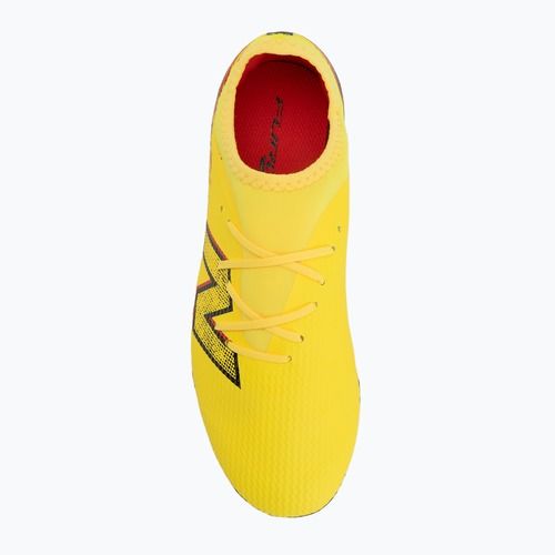 Детски футболни обувки New Balance Furon Team V8 FG punch yellow/black 100/fire cracker