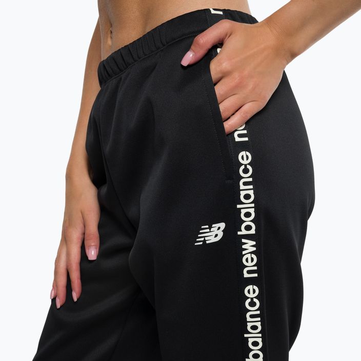 Дамски панталони за тренировка New Balance Relentless Performance Fleece black NBWP13176 4