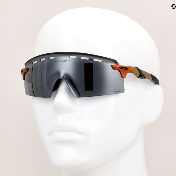 Слънчеви очила Oakley Encoder Strike Vented матово червено/златисто смяна на цветовете/призматично черно 12