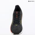 Дамски обувки за бягане Mizuno Wave Rider 28 black/evening primrose/poppy red 9
