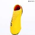 Футболни обувки New Balance Furon Team V8 FG punch yellow/black 100/fire cracker 9