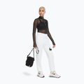Чантичка Nike Heritage 4 l black/black/white 7