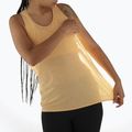 Дамски потник за бягане Salomon SHAKEout Air Tank warm apricot 3