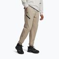 Мъжки панталони за тренировка Under Armour Unstoppable Joggers city khaki/black