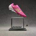 Футболни обувки New Balance Tekela Elite Low V5 FG pink heat/metallic gold/pink satin 8