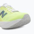 Дамски обувки за бягане New Balance FuelCell Rebel V5 afterglow/deep end 7