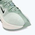 Дамски обувки Nike Motiva 2 barely green/steam/sail/black 7
