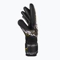 Детски вратарски ръкавици Reusch Attrakt Silver NC Finger Support Junior black/gold/white/black 4