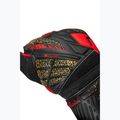 Вратарски ръкавици Reusch Attrakt Solid black/gold/fiery red 6