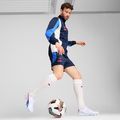 Футболни обувки PUMA King Ultimate FG/AG puma white/bluemazing/flat light grey/sunset glow 10
