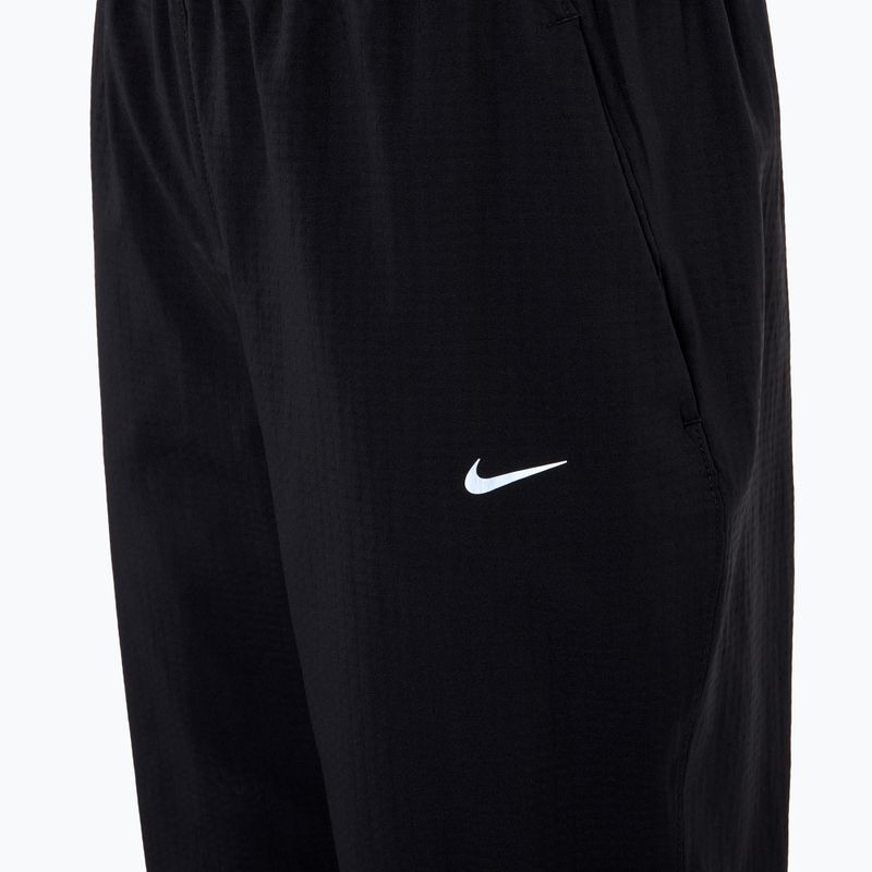 Дамски панталони за бягане Nike Dri-Fit Fast Mid-Rise 7/8 black 3