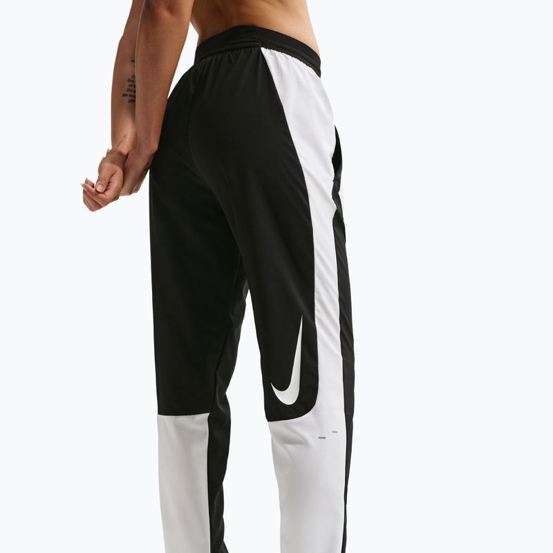 Дамски панталони за бягане Nike Tempo Swoosh Dri-Fit Mid-Rise 7/8 black/white 4