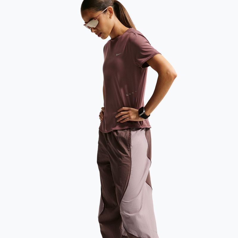 Дамски панталони за бягане Nike Swift UV Repel Mid-Rise tatoo/light violet ore 6