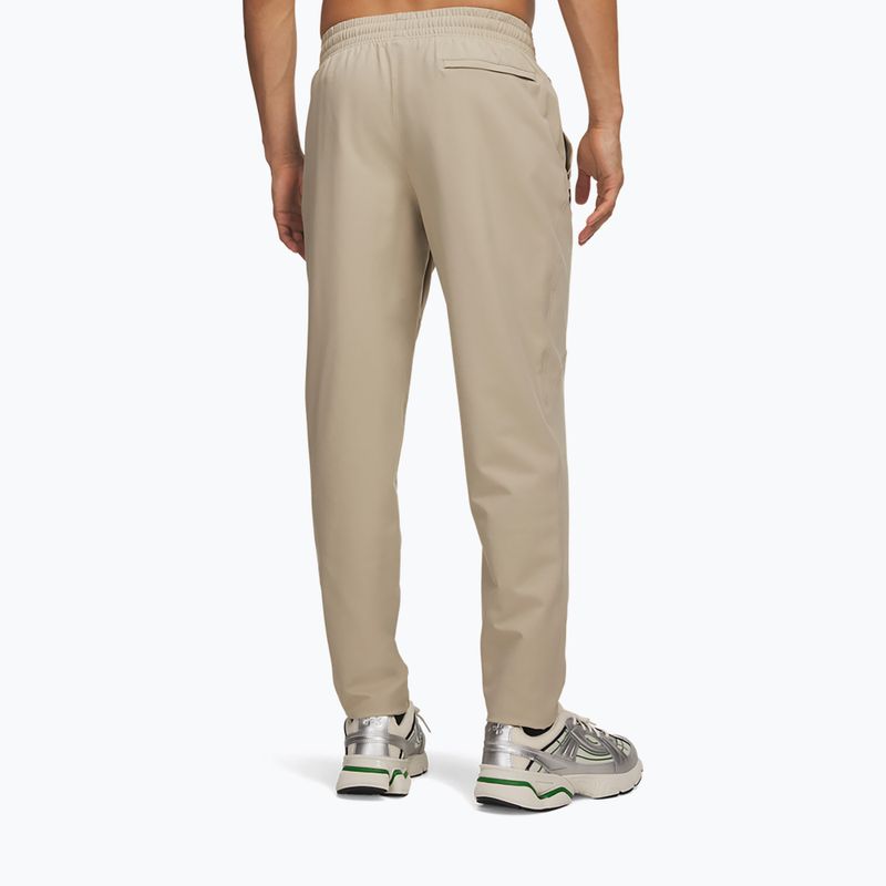 Мъжки панталони за тренировка Under Armour Unstoppable Tapered Pants city khaki/black 3