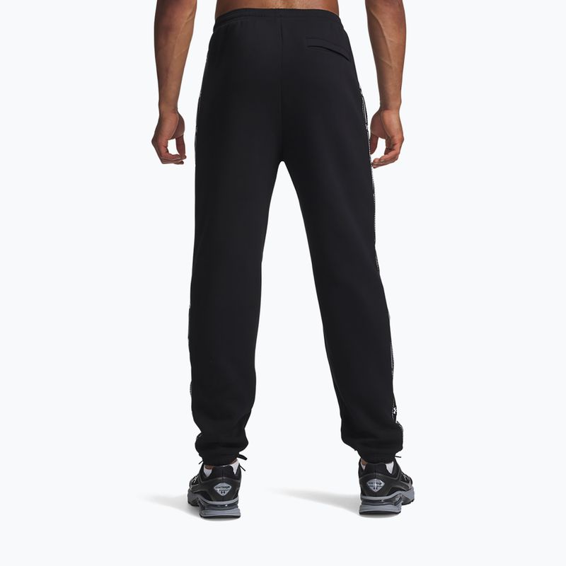 Мъжки панталони за бягане Under Armour Icon Fleece Taped Jogger ultimate black/white 3
