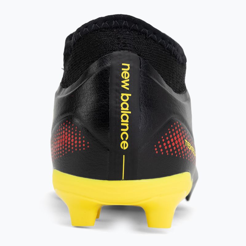 Детски футболни обувки New Balance Tekela Team V5 black 100/punch yellow/fire cracker 6