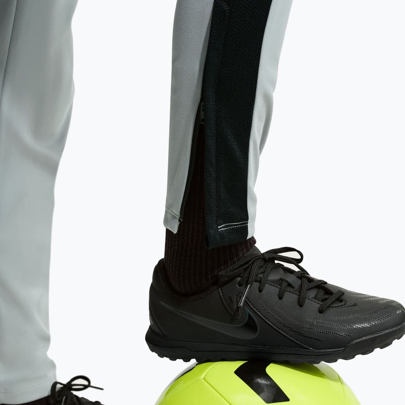 Детски панталони Nike Academy Dri-Fit Jr light smoke grey/white/black/metallic gold 7