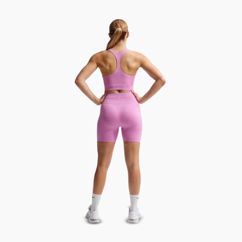 Тренировъчен топ Nike Pro Seamless Dri-Fit Cropped light magenta 3