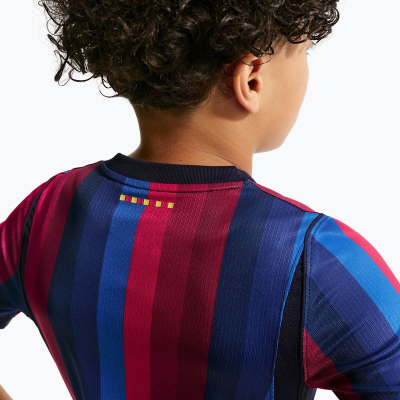 Детска футболна тениска Nike FC Barcelona Dri-Fit Stadium Home deep garnet/blue void/mineral yellow 11