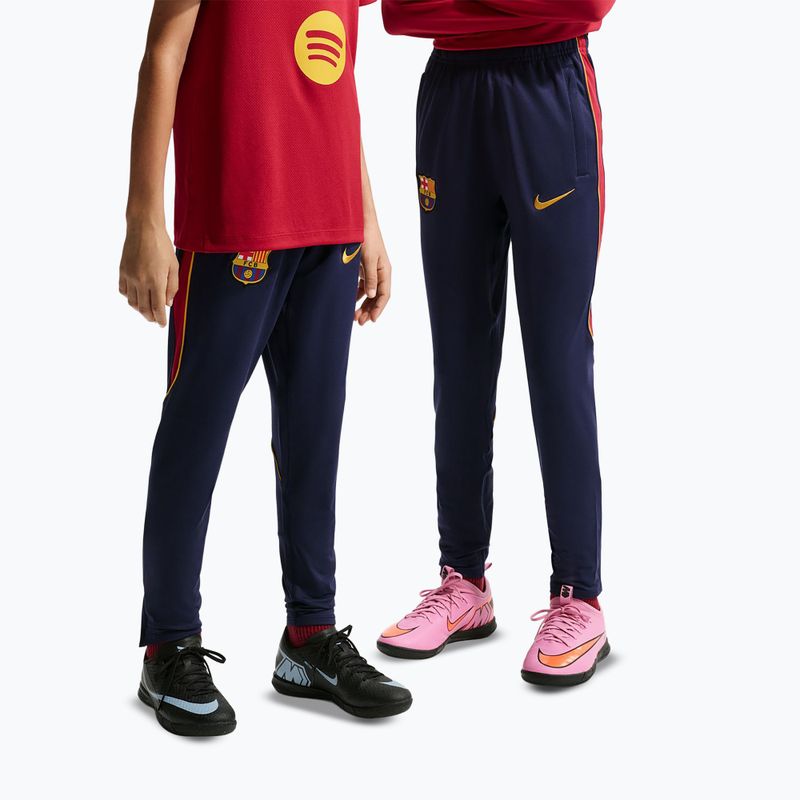 Детски футболни панталони Nike FC Barcelona Strike Dri-Fit blackened blue/noble red/yellow