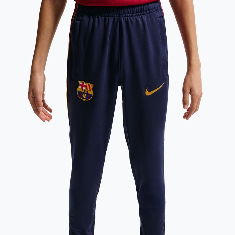 Детски футболни панталони Nike FC Barcelona Strike Dri-Fit blackened blue/noble red/yellow 7
