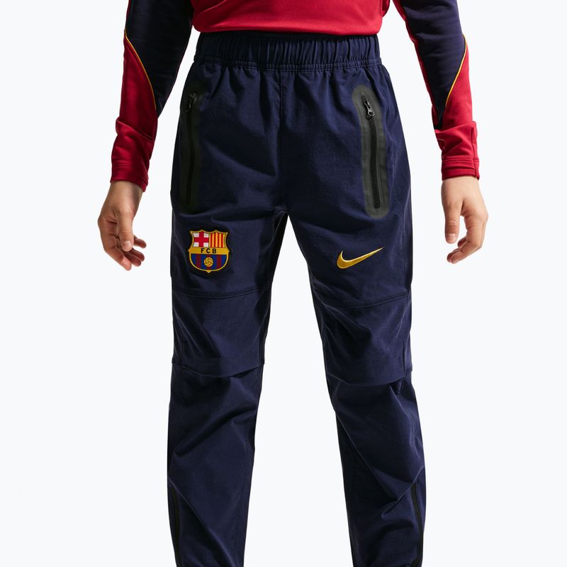 Детски футболни панталони Nike FC Barcelona Tech Woven blackened blue/black/mineral yellow 4