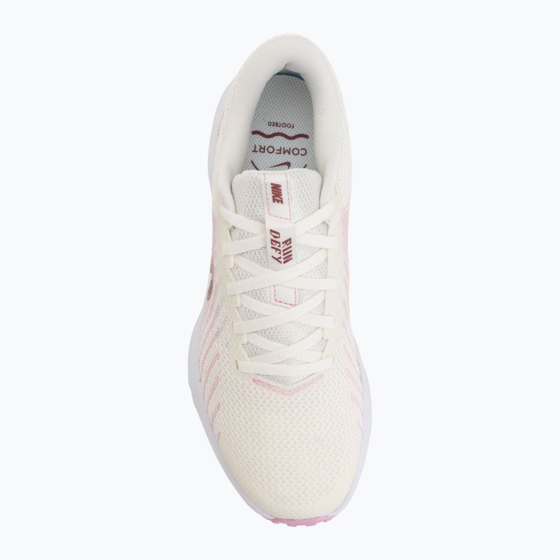 Дамски обувки за бягане Nike Run Defy sail/white/pink rise/pink smoke 5