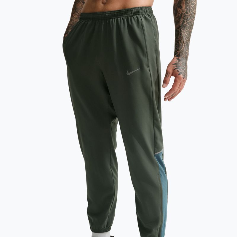 Мъжки панталони за бягане Nike Miler Dri-Fit Woven camo green/mineral slate 4
