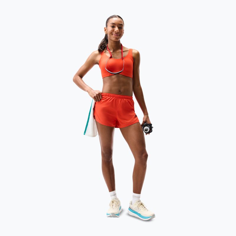 Дамски шорти за бягане New Balance Run Essentials 3" Short neo flame 2