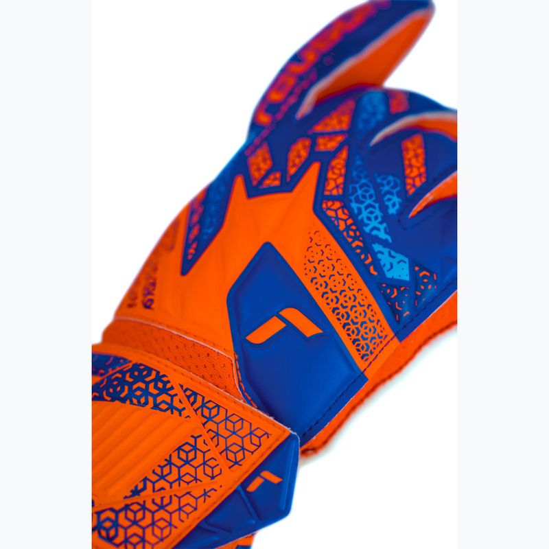 Детски вратарски ръкавици Reusch Attrakt Solid Junior shocking orange/blue 6