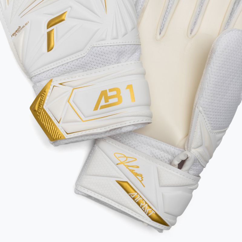 Детски вратарски ръкавици Reusch Attrakt AB1 Solid Junior white/gold 5
