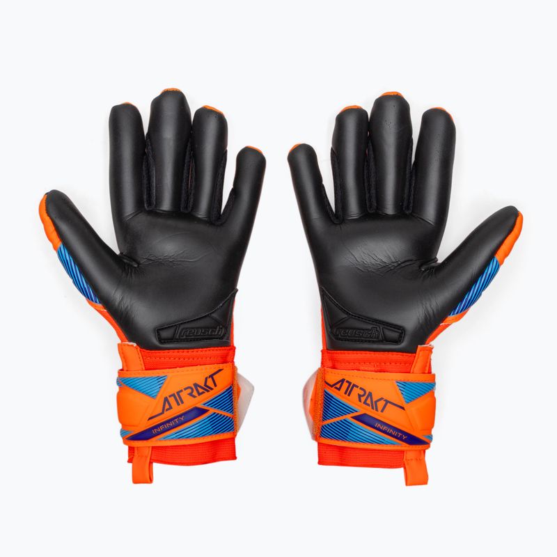 Детски вратарски ръкавици Reusch Attrakt Infinity Evolution NC Junior shocking orange/blue/black 3