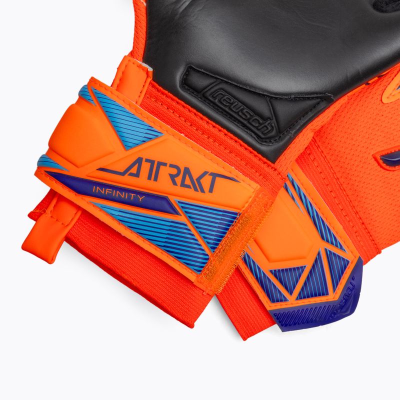 Детски вратарски ръкавици Reusch Attrakt Infinity Evolution NC Junior shocking orange/blue/black 5