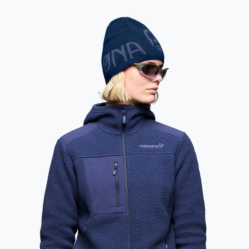 Зимна шапка NORRONA MerinoUll Logo Beanie indigo night melange 6