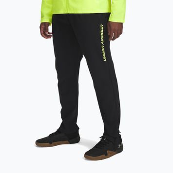 Мъжки панталон за бягане Under Armour Storm Run черен / жълт с висока видимост / светлоотразителен