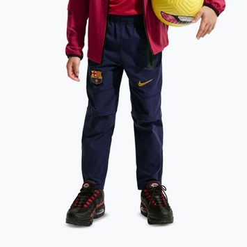 Детски футболни панталони Nike FC Barcelona Tech Woven blackened blue/black/mineral yellow