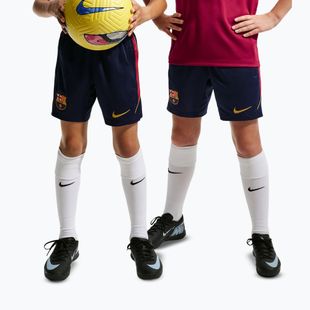 Детски футболни шорти Nike FC Barcelona Strike blackened blue/noble red/mineral yellow